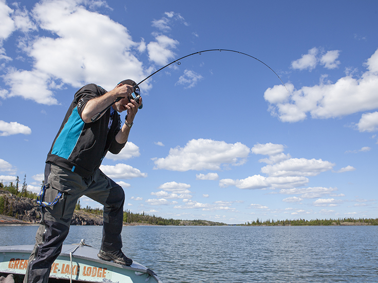 pêcheur avec une canne à pêche